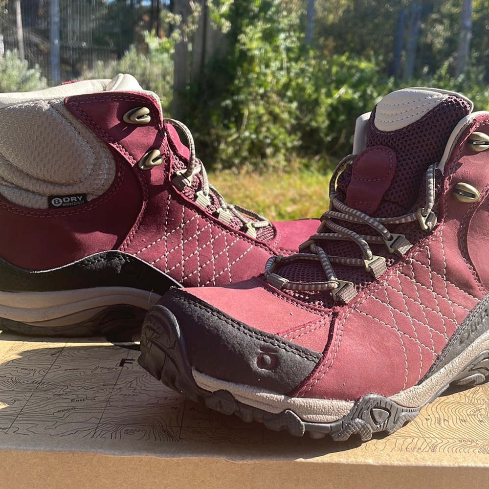 Brand new Oboz trail boots. Waterproof. Worn once around the backyard.